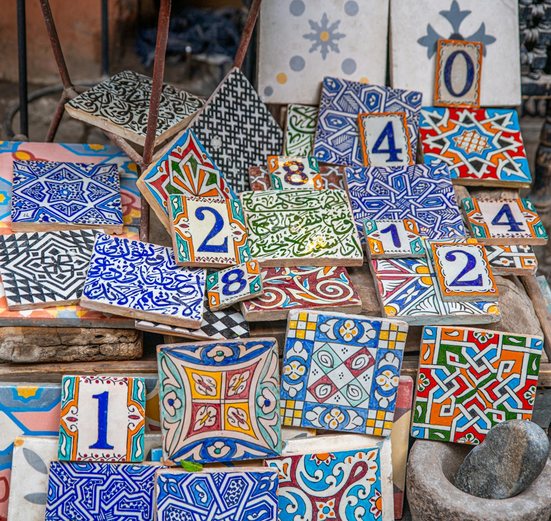 Colorful decorative tiles with numbers and patterns.