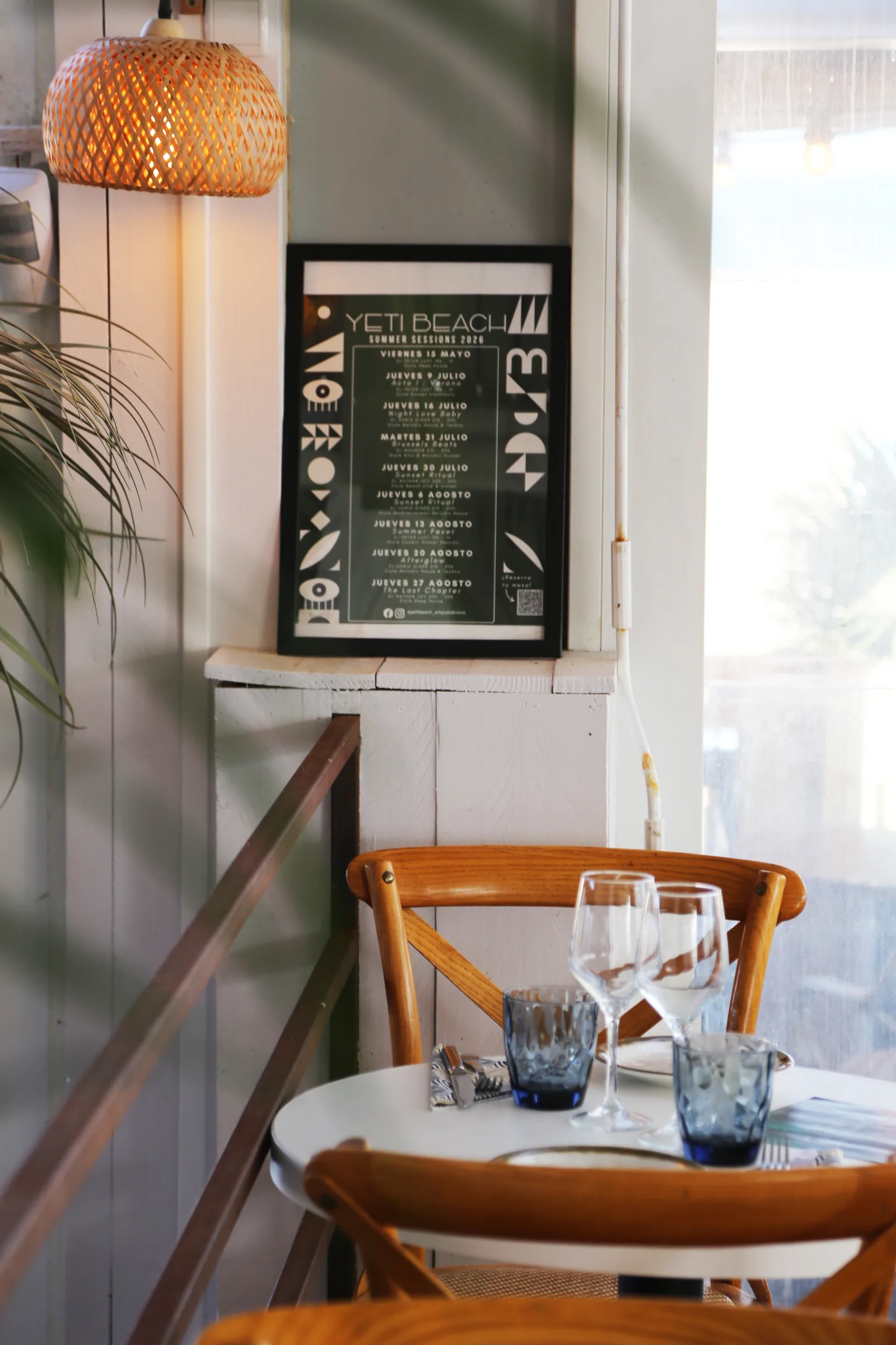 Interior of Yeti Restaurante featuring a menu and table setting.