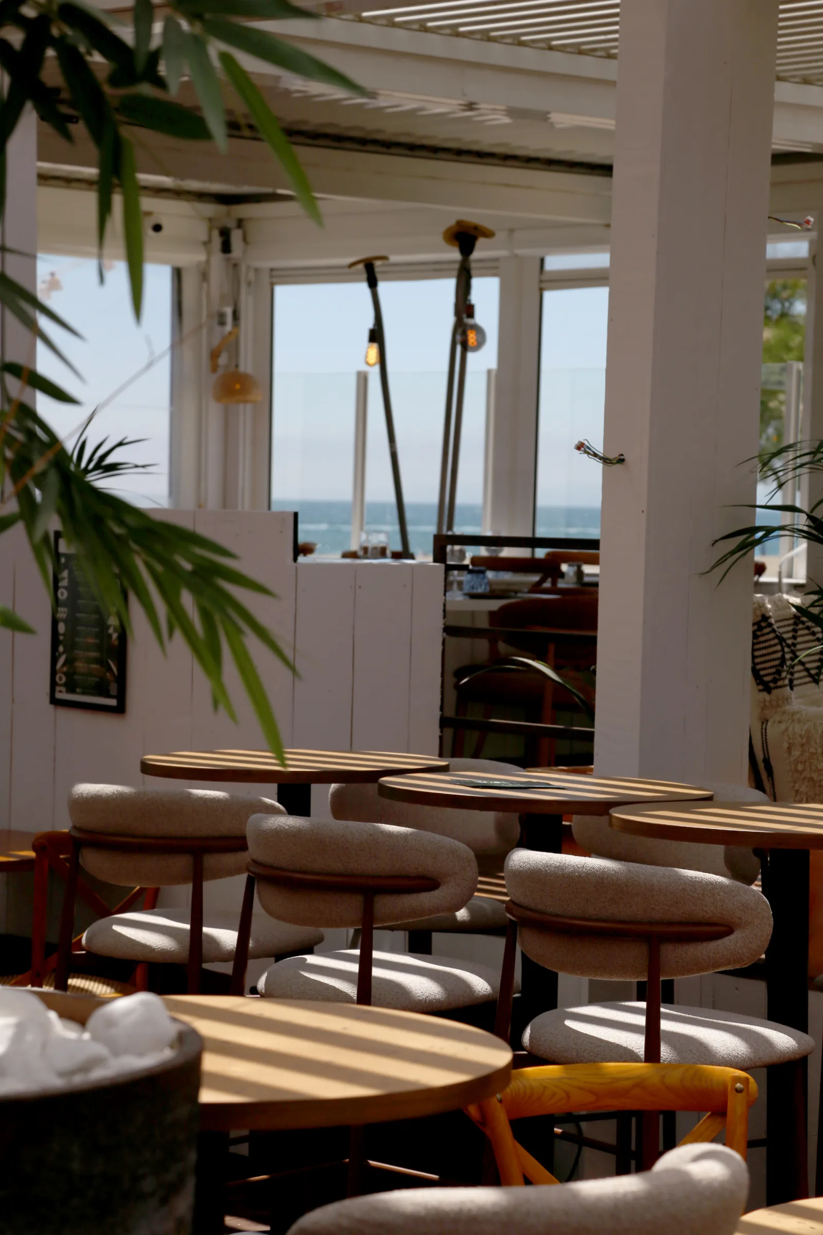 Interior view of a restaurant with tables and chairs