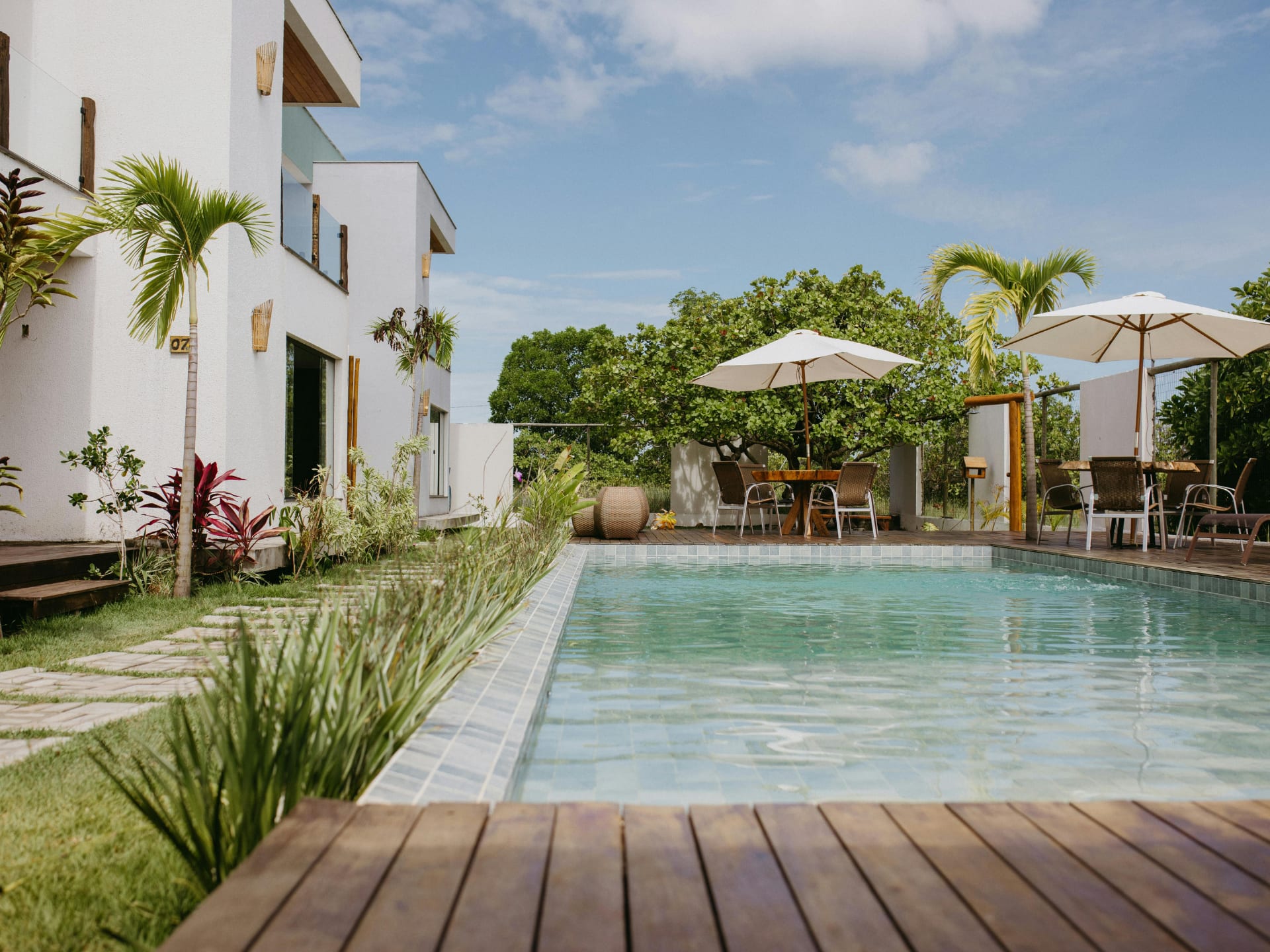 Modern villa with a swimming pool and garden area