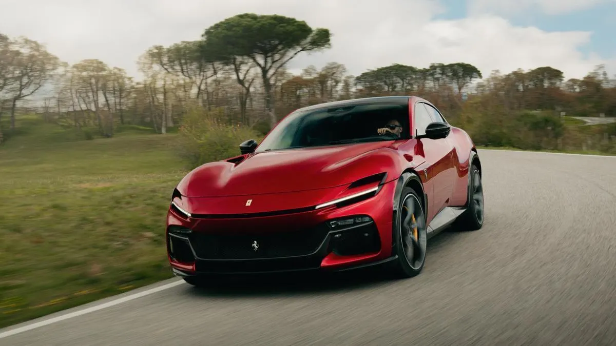 Red sports car on a road